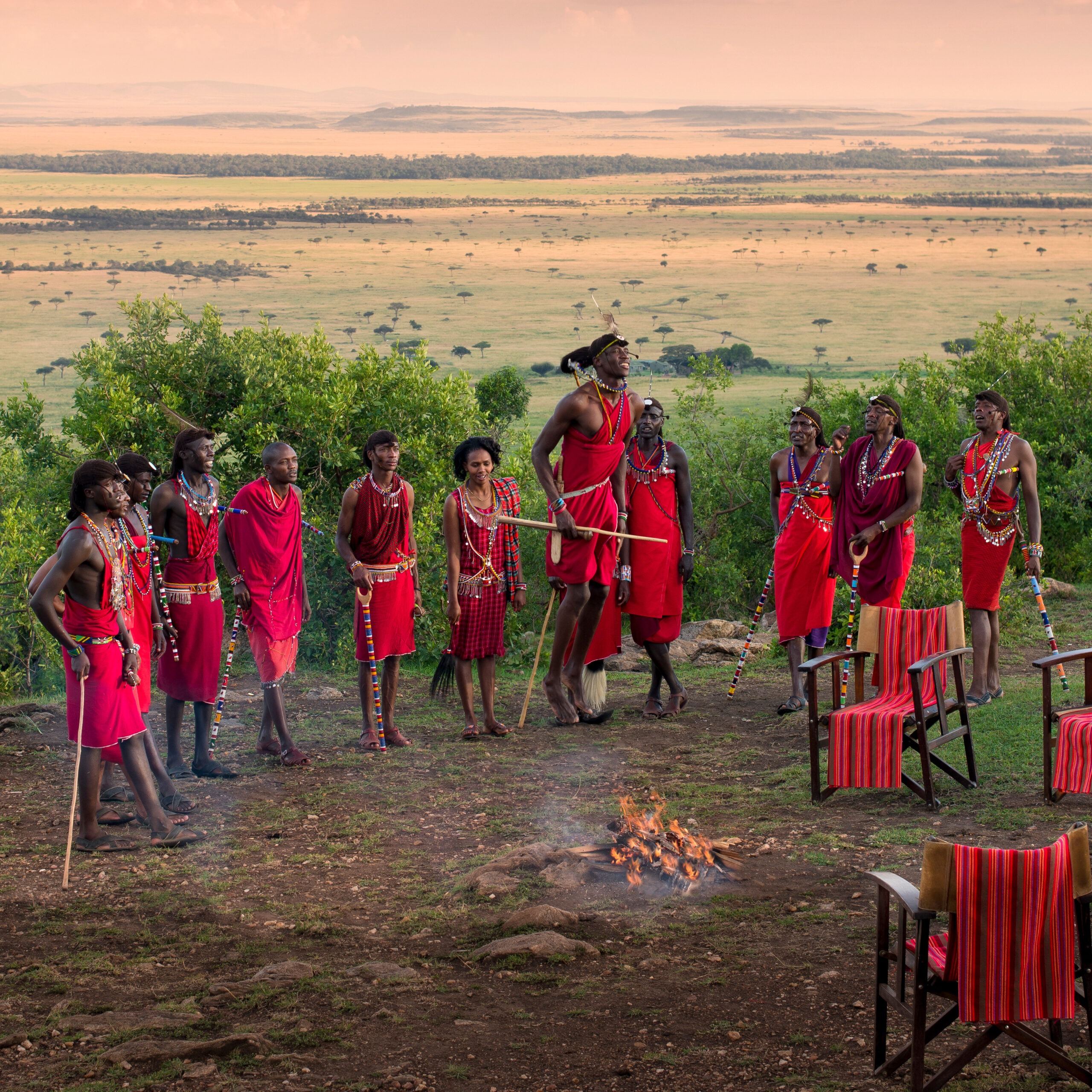 masai mara national reserve, kenya , with maasai community morans chanting their traditional songs