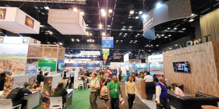 Investors, tourism leaders and technology innovators networking at a tourism trade fair in Africa focused on investment, culture and innovation.
