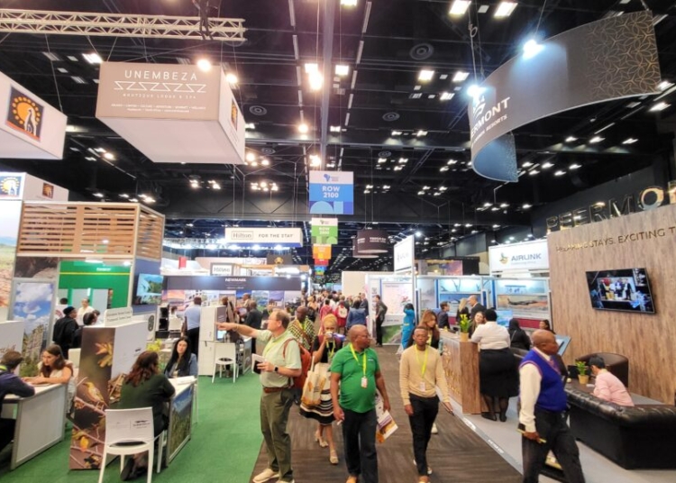 Investors, tourism leaders and technology innovators networking at a tourism trade fair in Africa focused on investment, culture and innovation.